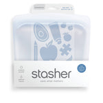 Reusable Stasher Sandwich Size silicone storage bag with clear body and green zipper, suitable for sandwiches and snacks.