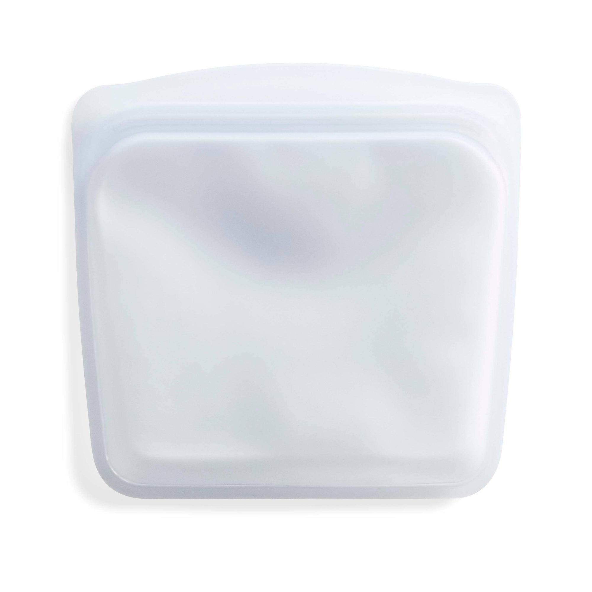Reusable Stasher Sandwich Size silicone storage bag with clear body and green seal for food storage and freshness.