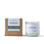 11.5 oz soy candle in a glass jar by Keystone Inspired, with a lit wick and a warm, inviting glow.