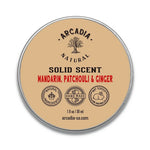 Natural solid perfume by Arcadia Naturals displayed in a sleek container, showcasing the elegant packaging and product details.