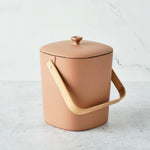 Bamboozle countertop composter in assorted colors, with a sleek design for kitchen composting and eco-friendly waste management.