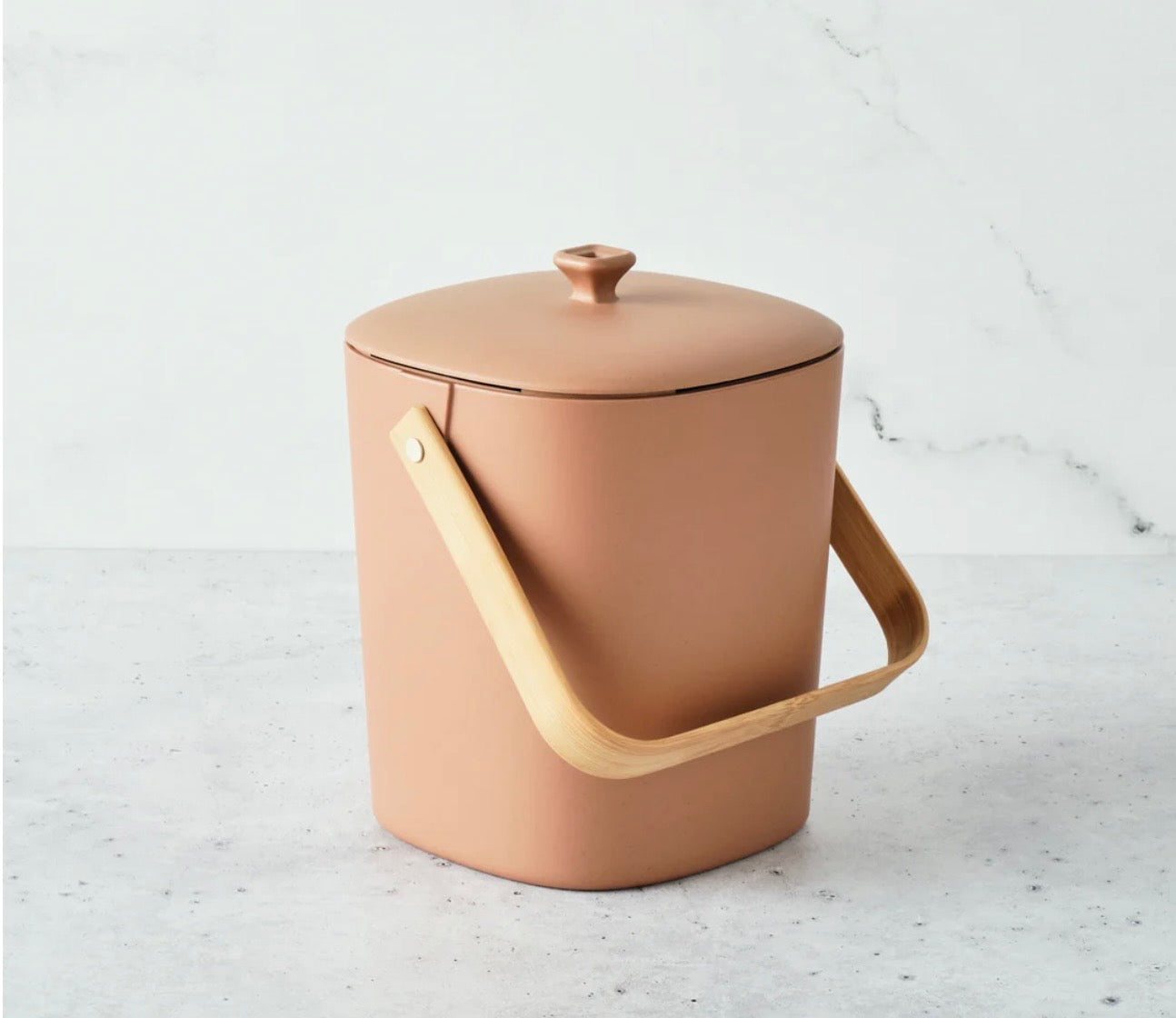 Bamboozle countertop composter in assorted colors, with a sleek design for kitchen composting and eco-friendly waste management.