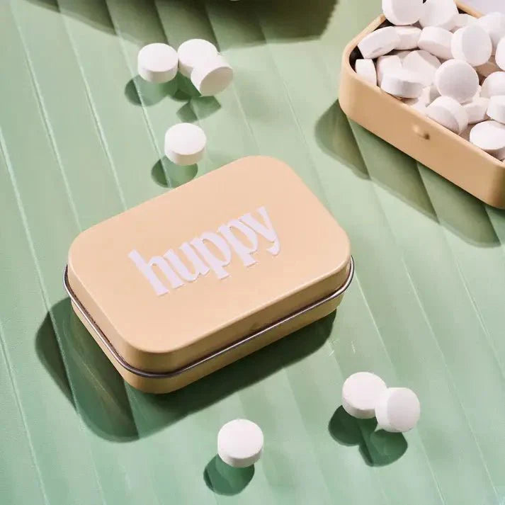 Huppy Travel Tin with lid, compact metal container for storing small items or snacks, featuring a sleek design.