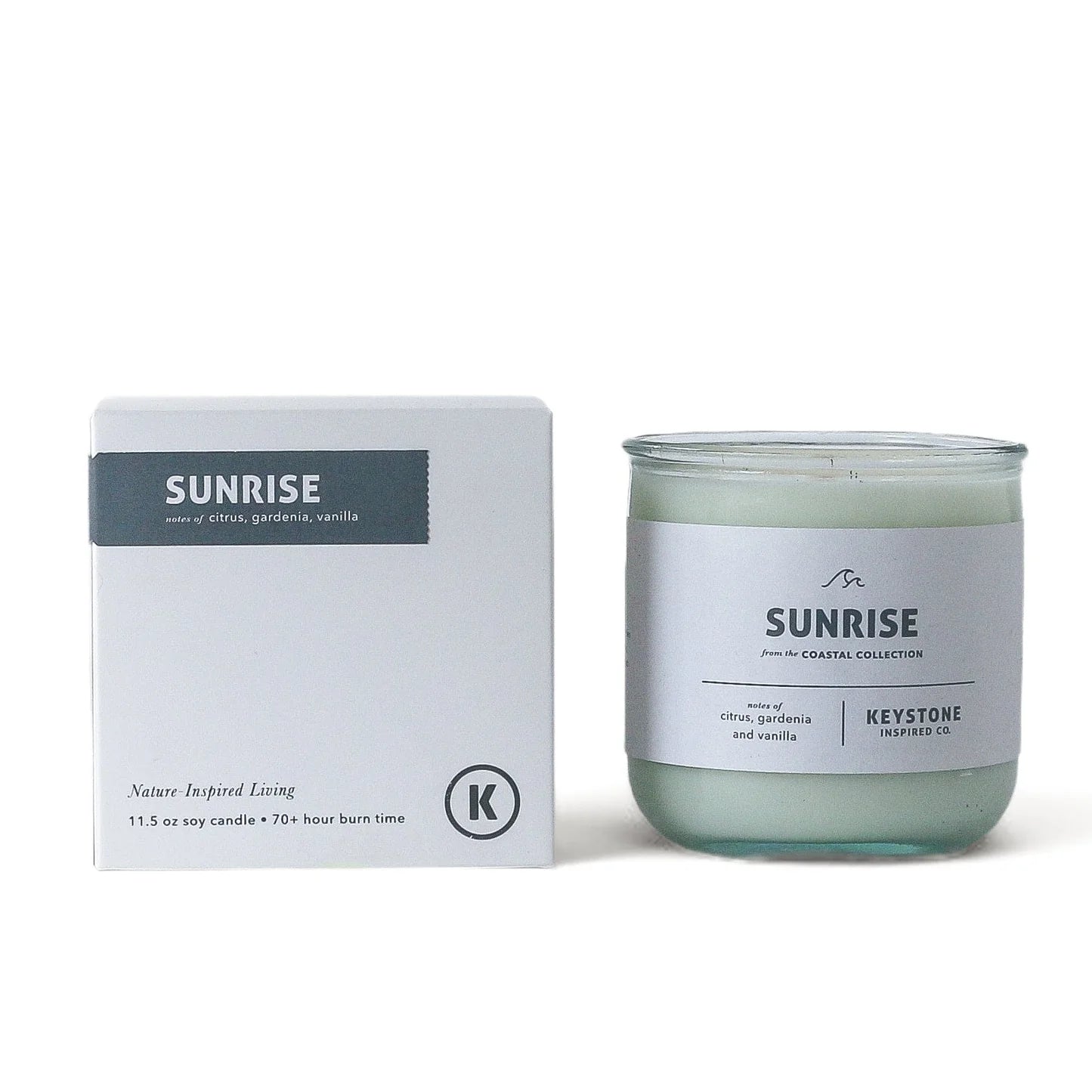 11.5 oz Keystone Inspired soy candle in a clear glass jar with a wooden wick, ready to create a cozy ambiance.