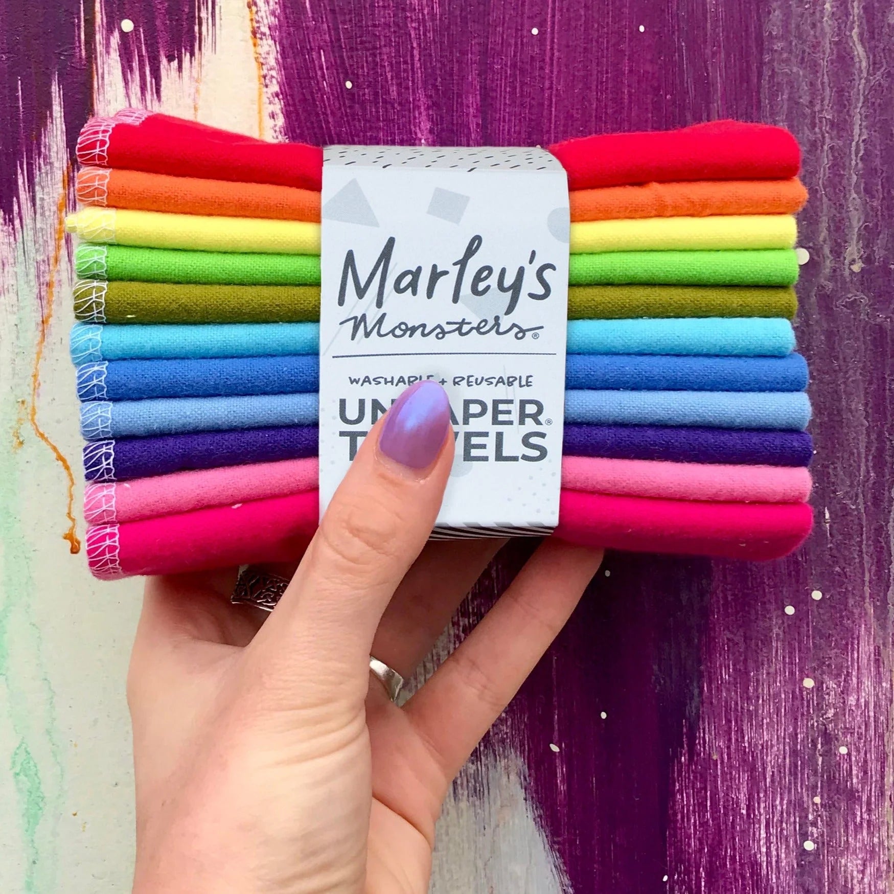 Stacked Marley’s UNpaper Towels 12-pack by Marley's Monsters, reusable eco-friendly cloth towels on a white background.
