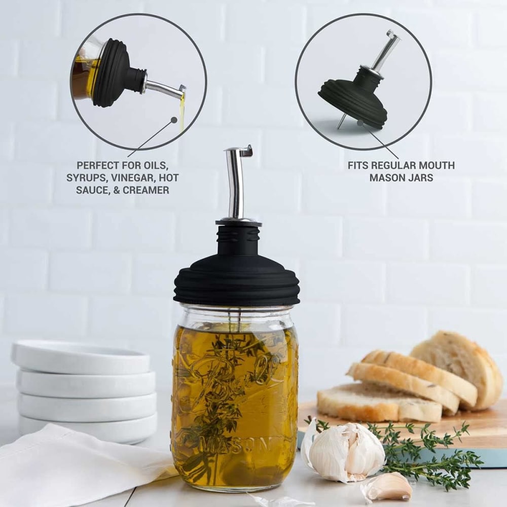ReCap Mason jar pour spout lid attached to a glass jar, ideal for easy pouring and sealing of beverages or liquids.