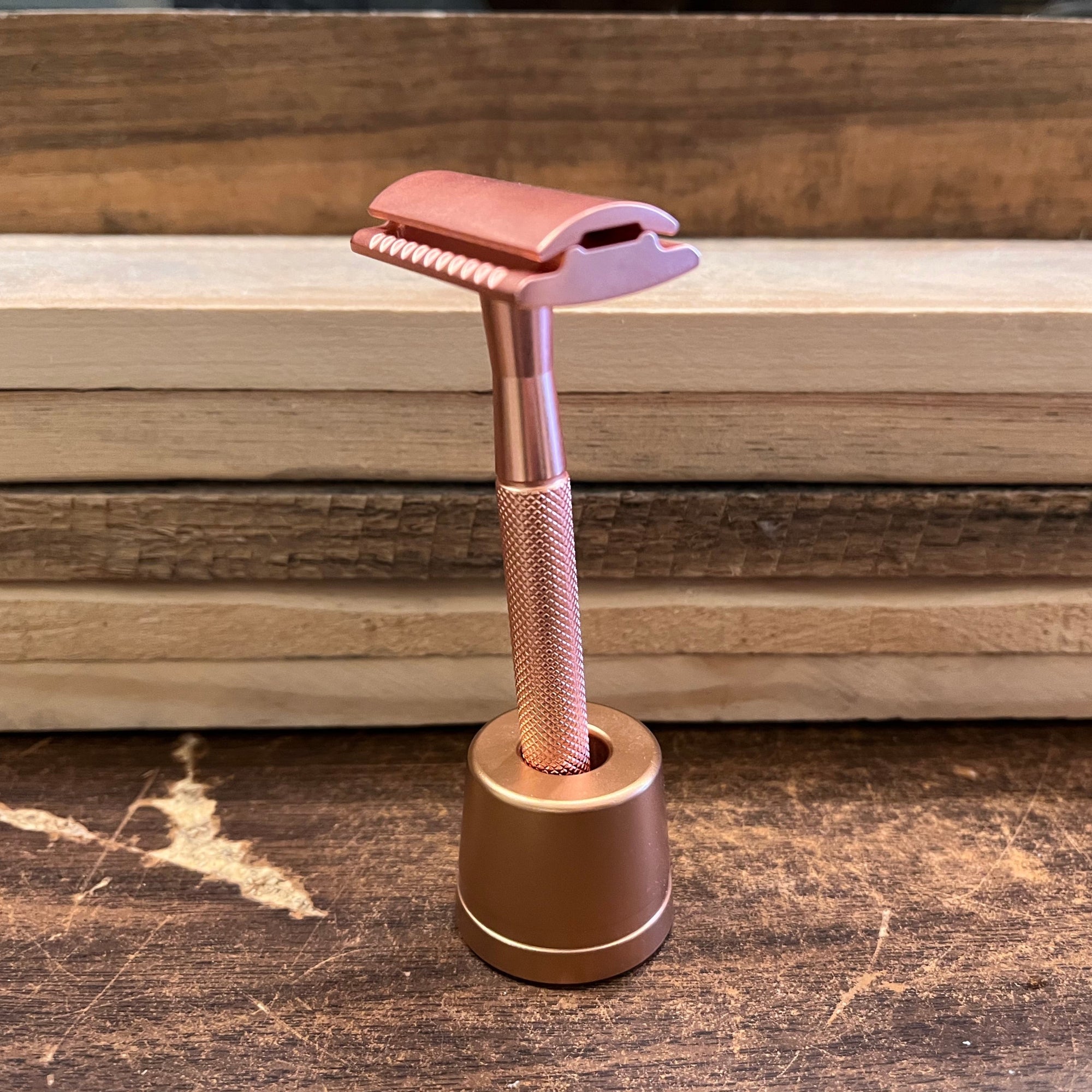 Coated brass safety razor from Ningbo Haward Razor with a sleek handle and polished finish, designed for a close, comfortable shave.