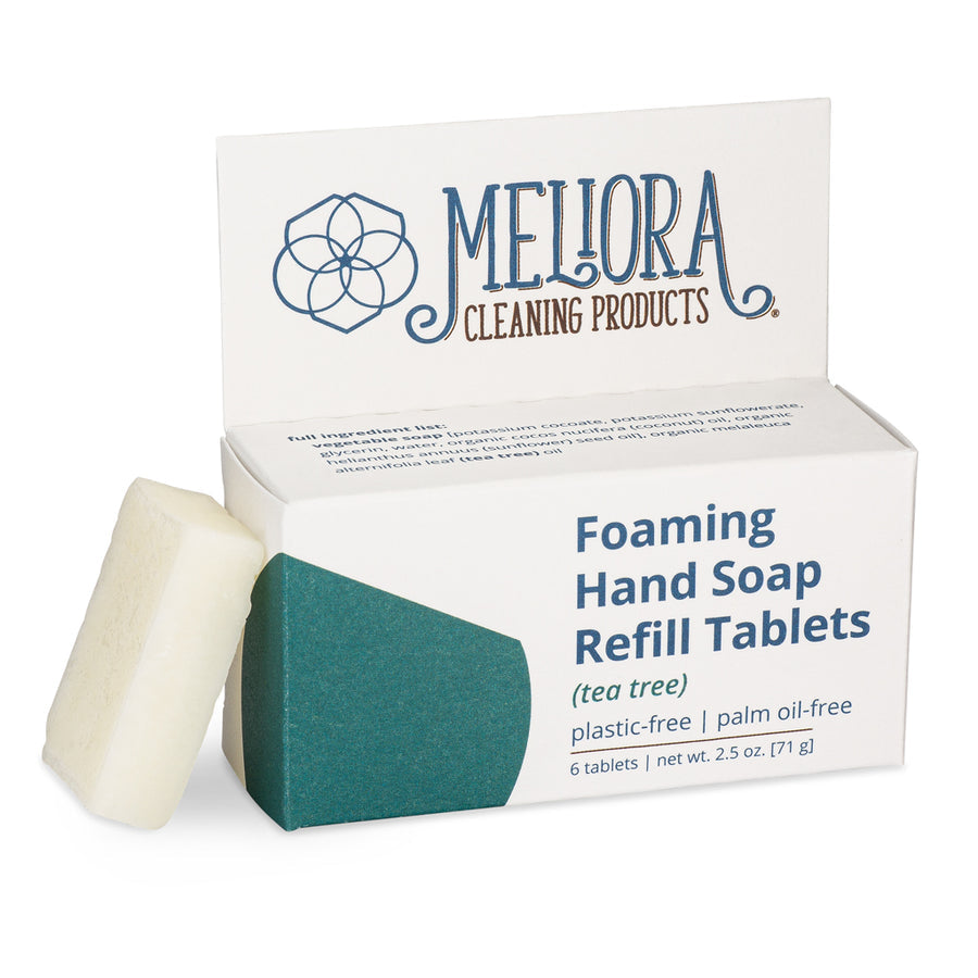 Meliora foaming hand soap refill tablets in a clear container, ready to dissolve for eco-friendly hand washing.