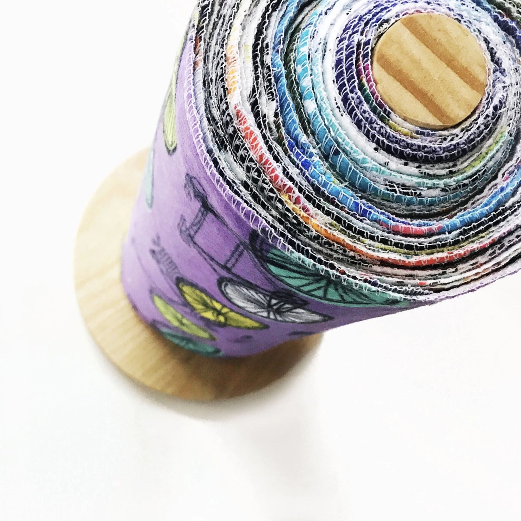 Rolled Marley’s UNpaper Towels by Marley's Monsters, reusable eco-friendly paper towel alternatives on a roll.