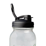 Black Mason jar pour spout lid by ReCap, designed for easy pouring and sealing Mason jars for beverages and storage.