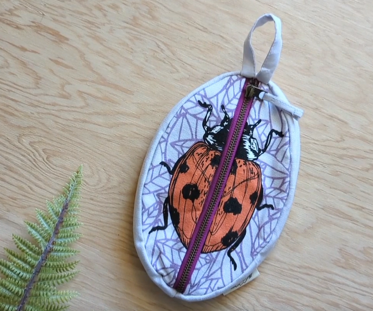 Ilikesara zippered pouches with colorful patterns and secure zipper closures, ideal for organizing small accessories or cosmetics.