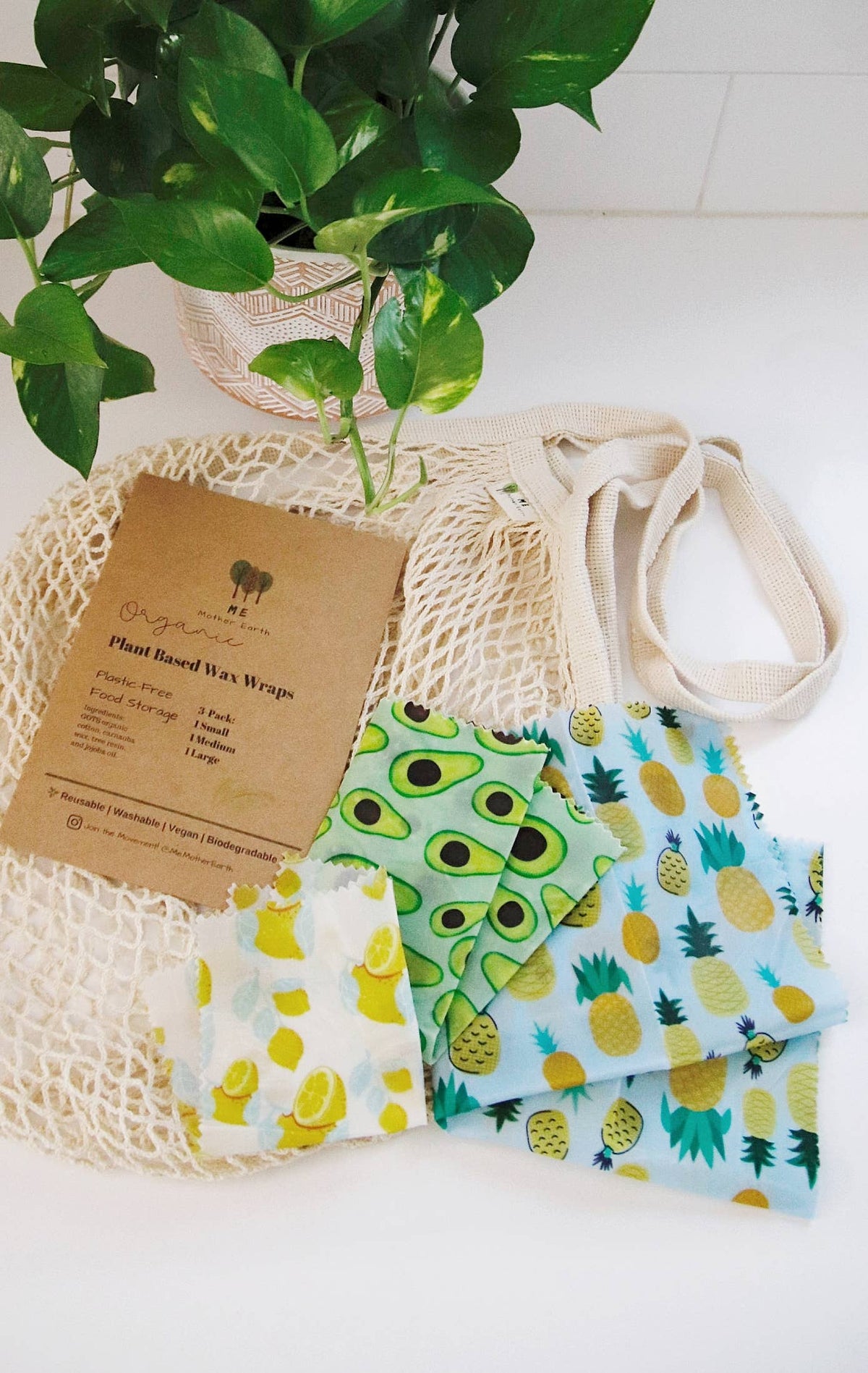 Me Mother Earth vegan plant-based wax wraps in various sizes, eco-friendly and colorful with natural patterns on a white background.